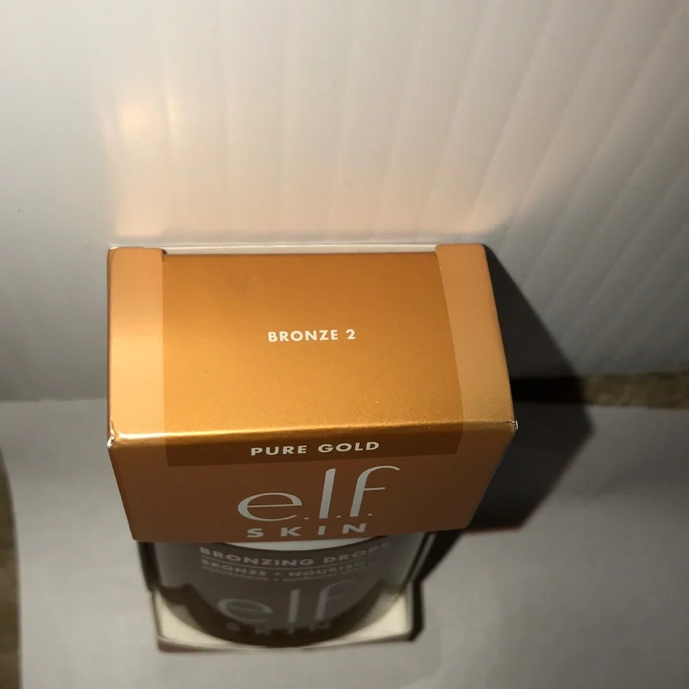 Elf Skin Bronzing Drops in 2 Pure Gold w/yellow gold shimmer light-tan skin tone
